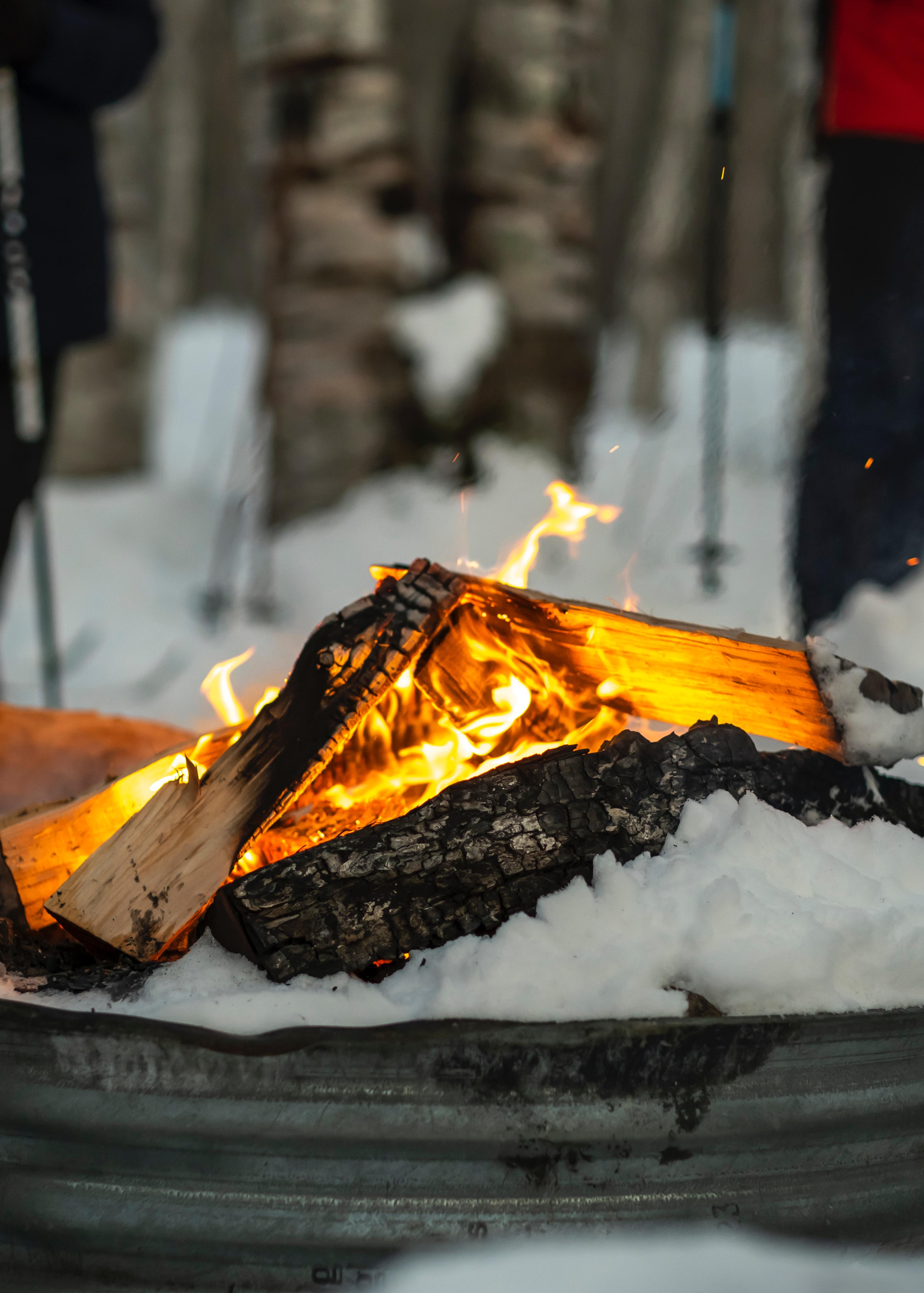 campfire in a snowy firepit