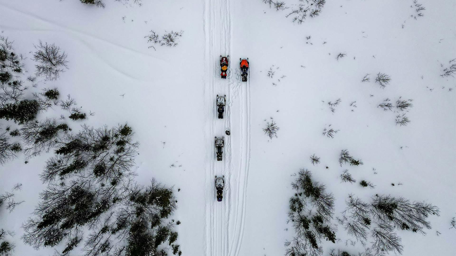 Drone view of snowmobiles.