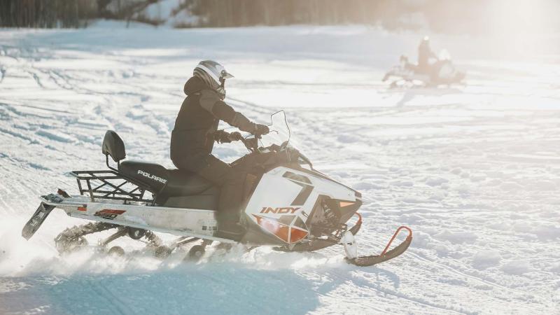 Two snowmobiles.