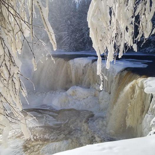Upper Tahquamenon Falls covered in snow and ice