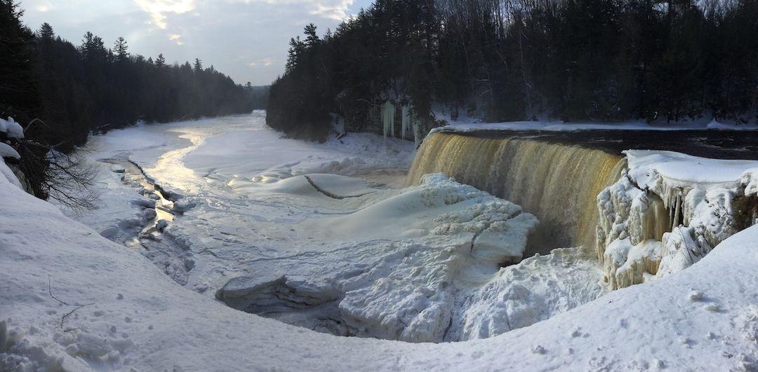 Upper Tahquamenon Falls covered in snow and ice